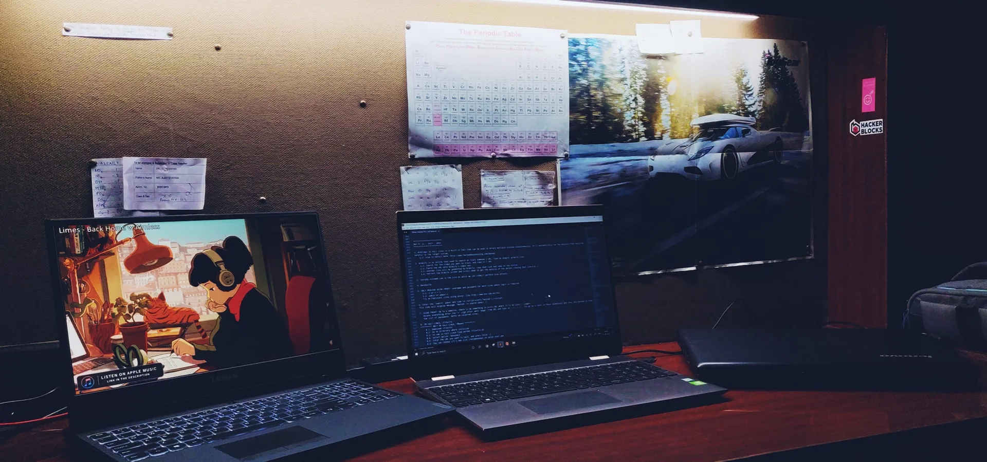 Desk setup with 3 laptops