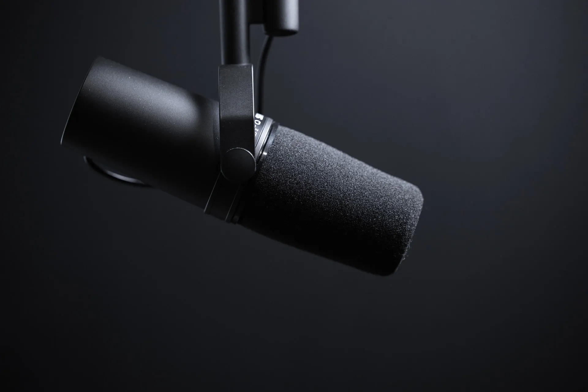 black microphone with dark background